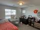 Bright bedroom featuring a cozy bed, vanity, and organized storage solutions at 5404 Scandia Lore Ct, Las Vegas, NV 89130