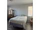 Bedroom with hardwood floors, neutral paint, and natural light at 5404 Scandia Lore Ct, Las Vegas, NV 89130