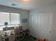 Bedroom with carpet floors, white closet doors, and window with blinds at 5404 Scandia Lore Ct, Las Vegas, NV 89130