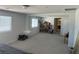 Airy bonus room offering great natural light and neutral carpet at 5404 Scandia Lore Ct, Las Vegas, NV 89130