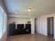Spacious living room with hardwood floors and two large windows at 5404 Scandia Lore Ct, Las Vegas, NV 89130