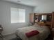 Main bedroom with neutral paint, hardwood floors, and natural light at 5404 Scandia Lore Ct, Las Vegas, NV 89130
