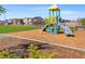 Community playground with modern equipment at 6245 Blood Lily Ave, Las Vegas, NV 89122