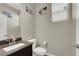 Well-lit half bathroom with modern fixtures, clean lines and neutral paint at 63 Harrison Rose Ct, Las Vegas, NV 89110