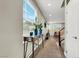 Inviting foyer with stylish console table, open staircase, and views into the spacious living area at 63 Harrison Rose Ct, Las Vegas, NV 89110