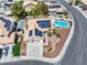 Take in the scene from above and appreciate this house with solar panels and a backyard pool at 6328 Yankee Meadow Cir, Las Vegas, NV 89130