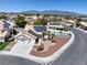 Stunning aerial view of home with solar panels, desert landscaping, and refreshing backyard pool at 6328 Yankee Meadow Cir, Las Vegas, NV 89130