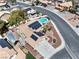 Breathtaking aerial view of home with solar panels and refreshing backyard pool in a desirable neighborhood at 6328 Yankee Meadow Cir, Las Vegas, NV 89130
