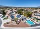 High aerial shot shows solar panels and a sparkling pool in the backyard at 6328 Yankee Meadow Cir, Las Vegas, NV 89130