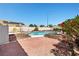 Backyard pool with red brick landscaping, perfect for entertaining Gathering and friends at 6328 Yankee Meadow Cir, Las Vegas, NV 89130