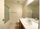 Bathroom includes a sink, mirror, and a shower with glass door at 6459 Rusticated Stone Ave # 103, Henderson, NV 89011
