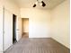 Carpeted bedroom with closet and neutral paint, ready for customization at 6459 Rusticated Stone Ave # 103, Henderson, NV 89011