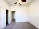 Spacious bedroom with closet and ceiling fan at 6459 Rusticated Stone Ave # 103, Henderson, NV 89011