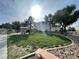 Community park with shaded picnic area and well-maintained lawn at 6459 Rusticated Stone Ave # 103, Henderson, NV 89011