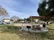 Picturesque community park featuring picnic tables, playground, and lush greenery for outdoor enjoyment at 6459 Rusticated Stone Ave # 103, Henderson, NV 89011