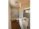 Clean and functional bathroom with vanity, tub, and shower, offering essential amenities at 6460 Linda Ln, Las Vegas, NV 89103