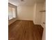 Bedroom with closet space, bright window, and modern ceiling fan at 6460 Linda Ln, Las Vegas, NV 89103