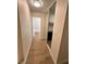 Hallway with closet providing storage space and easy access to the adjacent bathroom at 6460 Linda Ln, Las Vegas, NV 89103