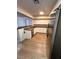 Bright kitchen features stainless steel appliances and ample counter space, perfect for cooking at 6460 Linda Ln, Las Vegas, NV 89103