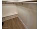 Walk-in closet with built-in shelving and ample storage space, providing organization and convenience at 6460 Linda Ln, Las Vegas, NV 89103