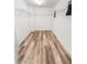 Walk-in closet featuring wood look floors and wire shelving at 6537 Ditmars St, Las Vegas, NV 89166