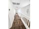 Upstairs hallway featuring patterned carpet and a window at 6537 Ditmars St, Las Vegas, NV 89166