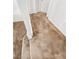 Hallway with carpeted floor leading to other rooms, with white railing on one side at 6537 Ditmars St, Las Vegas, NV 89166