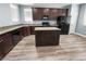 Modern kitchen featuring granite countertops, stainless steel appliances, and ample cabinet space at 6537 Ditmars St, Las Vegas, NV 89166