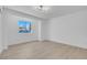 Bright, minimalist bedroom features natural light, clean lines, and modern decor at 6700 Pine Needle Ct, Las Vegas, NV 89108