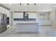 Spacious kitchen with a center island, stainless steel appliances, and white cabinetry at 701 Monroe Hill Pl, Henderson, NV 89011