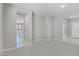 Open concept living room offering access to the kitchen and other living spaces at 701 Monroe Hill Pl, Henderson, NV 89011