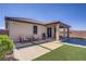 Backyard featuring a small pool, patio, lounge chairs and privacy wall at 748 Dellenbaugh Ct, Las Vegas, NV 89178