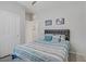 Comfortable bedroom with neutral walls and an entryway to another room at 748 Dellenbaugh Ct, Las Vegas, NV 89178