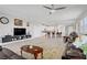 Spacious open-concept living room with modern furnishings and plenty of natural light at 748 Dellenbaugh Ct, Las Vegas, NV 89178