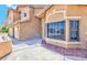 The exterior features an attractive stucco finish with modern windows and well-maintained landscaping at 7751 Locke Haven Dr, Las Vegas, NV 89123