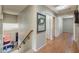 Hallway with hardwood floors and multiple doorways at 7751 Locke Haven Dr, Las Vegas, NV 89123