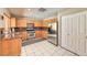 Well-equipped kitchen with stainless steel appliances, granite countertops, and ample cabinet space at 7751 Locke Haven Dr, Las Vegas, NV 89123