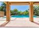 This backyard features a stunning pool, spa, and beautifully landscaped surroundings at 7751 Locke Haven Dr, Las Vegas, NV 89123