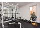 Community gym featuring weightlifting equipment, mirrored walls, and natural light for a bright workout space at 778 Oakmont Ave # 312, Las Vegas, NV 89109