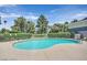 Community swimming pool surrounded by lush landscaping, offering a relaxing outdoor space at 778 Oakmont Ave # 312, Las Vegas, NV 89109
