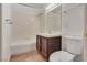 Cozy bathroom featuring a shower/tub combo, a vanity, tile floors, and a toilet at 7950 W Flamingo Rd # 2065, Las Vegas, NV 89147