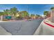 Rain Tree West community entrance with well-maintained landscaping and secure gated access at 7950 W Flamingo Rd # 2065, Las Vegas, NV 89147