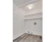 Laundry room featuring tile floors, white walls, shelving, and hookups for a washer and dryer at 7950 W Flamingo Rd # 2065, Las Vegas, NV 89147