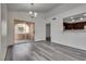 Living room with sliding glass doors to the exterior, great natural light, and open layout at 7950 W Flamingo Rd # 2065, Las Vegas, NV 89147