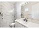 Modern bathroom with white marble shower, white countertops, and brushed nickel accents offering a spa-like experience at 801 Aquitaine Ct, Las Vegas, NV 89145