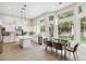 Bright kitchen features granite countertops, stainless steel appliances, and large windows at 801 Aquitaine Ct, Las Vegas, NV 89145