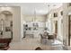 Spacious white kitchen featuring an island, modern appliances, and eat-in dining at 801 Aquitaine Ct, Las Vegas, NV 89145