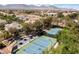 Aerial view of community tennis courts and picnic area at 801 Aquitaine Ct, Las Vegas, NV 89145