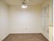 Simple bedroom featuring carpeted floors, a ceiling fan, and a window for natural light at 8070 W Russell Rd # 1028, Las Vegas, NV 89113