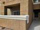 A modern building with private covered patio featuring textured stucco and bright, neutral color palette at 8070 W Russell Rd # 1028, Las Vegas, NV 89113